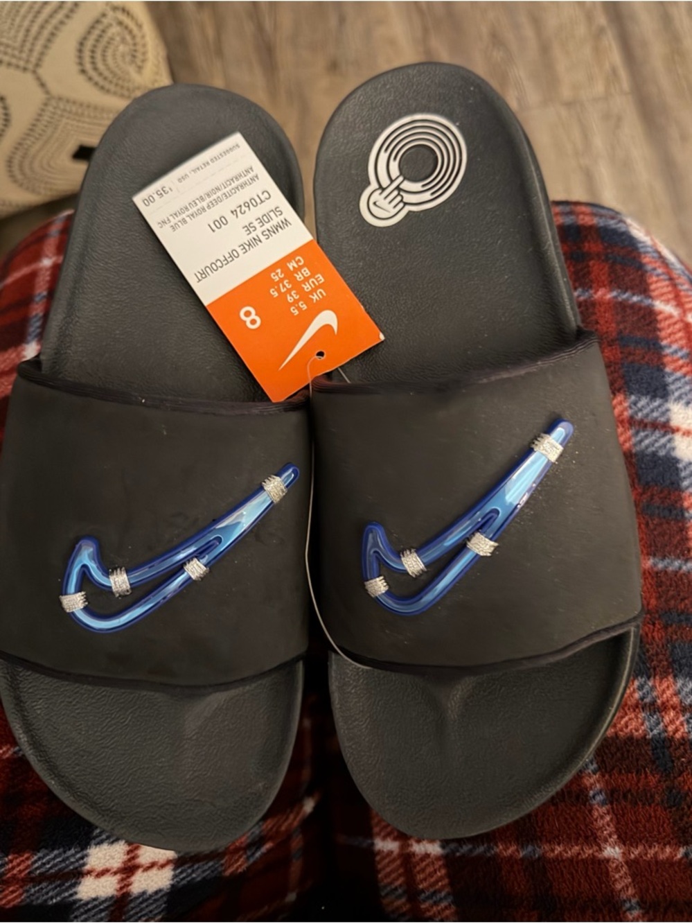 Women’s Nike Black Slides with Blue Accent Swoosh